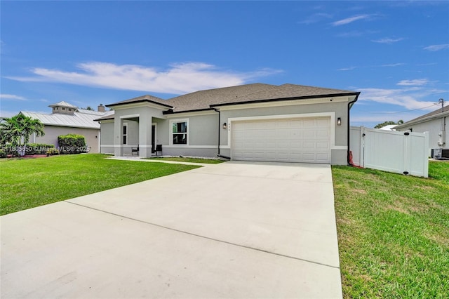 434 SW Namoit Pl, Port St Lucie, FL 34953 - view of front of property featuring stucco siding, a garage, and driveway