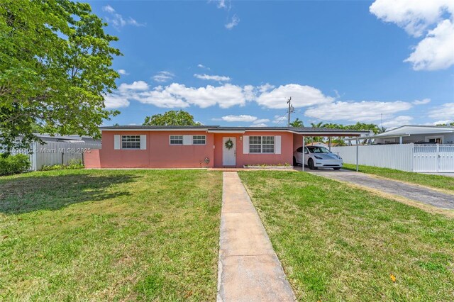 4230 SW 97th Pl, Miami, FL 33165 - single story home with stucco siding, asphalt driveway, and a carport