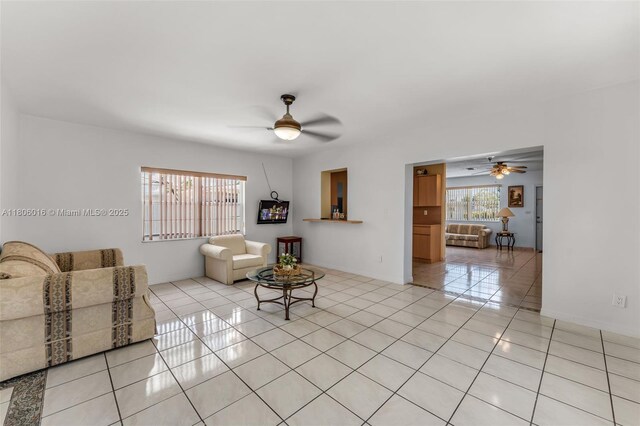 4230 SW 97th Pl, Miami, FL 33165 - living room featuring a ceiling fan, light tile patterned floors, and baseboards