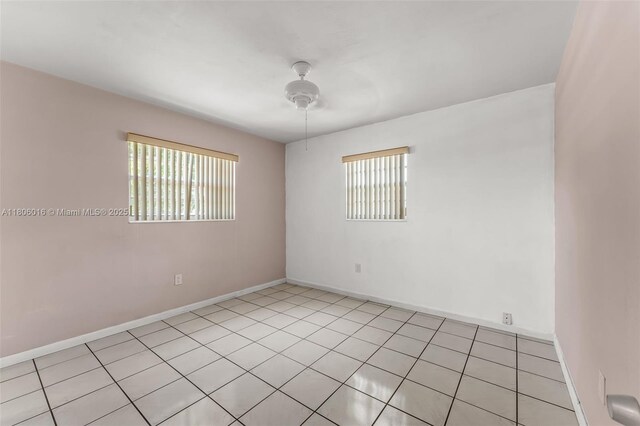 4230 SW 97th Pl, Miami, FL 33165 - unfurnished room featuring baseboards and light tile patterned flooring