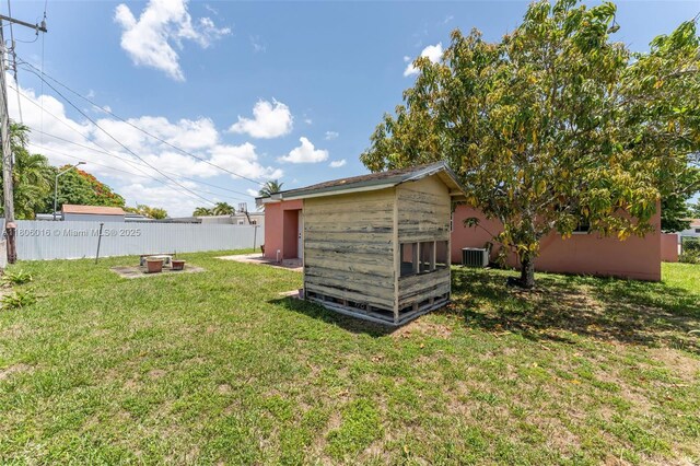 4230 SW 97th Pl, Miami, FL 33165 - view of yard featuring central AC and an outbuilding