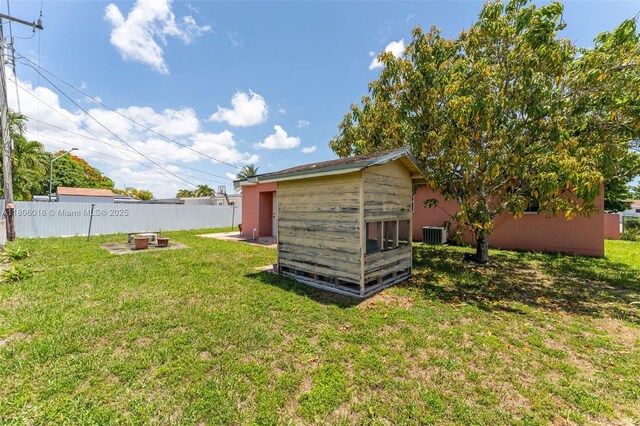 4230 SW 97th Pl, Miami, FL 33165 - view of yard featuring central AC and an outdoor structure