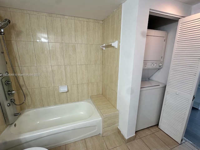 1750 N Bayshore Dr Unit 2906, Miami, FL 33132 - bathroom with stacked washer and clothes dryer, tub / shower combination, and tile patterned floors