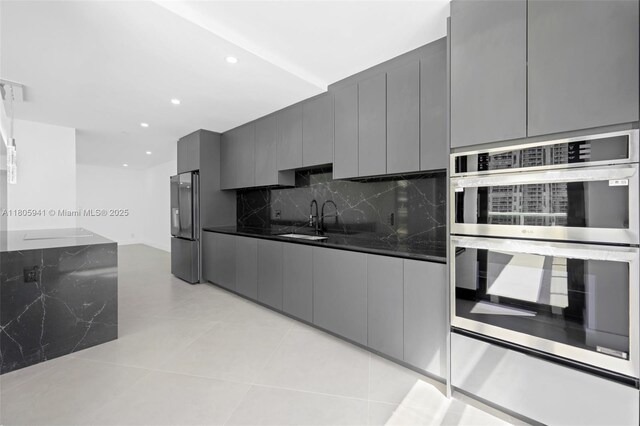 20281 E Country Club Dr Unit 1008, Aventura, FL 33180 - kitchen featuring gray cabinetry, stainless steel double oven, tasteful backsplash, modern cabinets, and recessed lighting