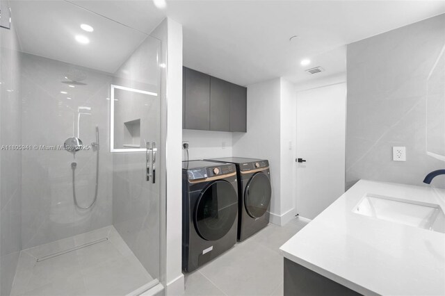 20281 E Country Club Dr Unit 1008, Aventura, FL 33180 - laundry area featuring separate washer and dryer, light tile patterned floors, and recessed lighting