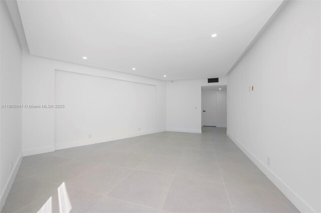 20281 E Country Club Dr Unit 1008, Aventura, FL 33180 - empty room featuring recessed lighting, light tile patterned floors, and baseboards