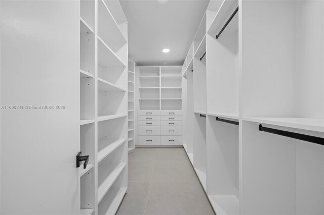 20281 E Country Club Dr Unit 1008, Aventura, FL 33180 - spacious closet featuring light tile patterned flooring