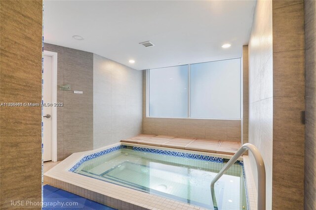 20281 E Country Club Dr Unit 1008, Aventura, FL 33180 - view of pool with an in-ground hot tub