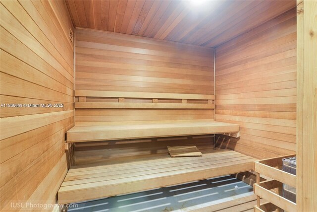 20281 E Country Club Dr Unit 1008, Aventura, FL 33180 - sauna with wood walls and wood ceiling