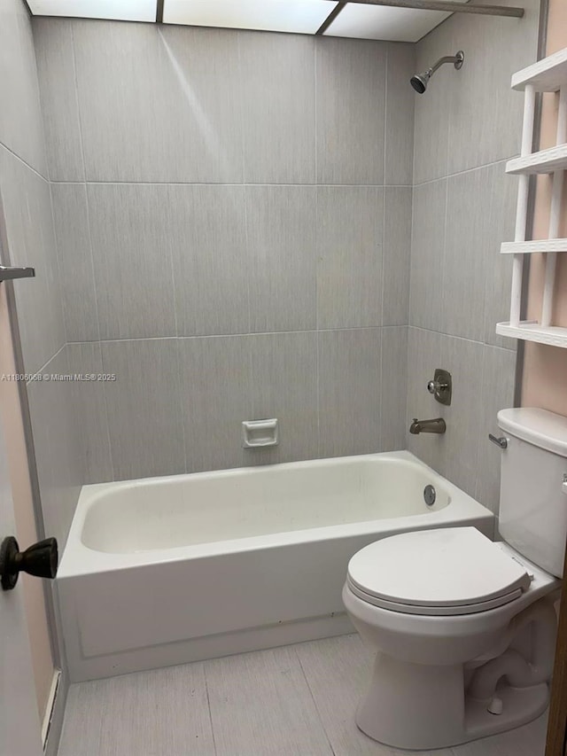 235 E Burgundy E Unit 235, Delray Beach, FL 33484 - bathroom featuring toilet and  shower combination