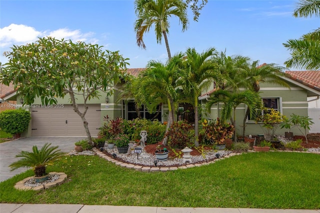 596 NW 164th Ave, Pembroke Pines, FL 33028 - view of front of property with stucco siding, a tiled roof, a front yard, and driveway