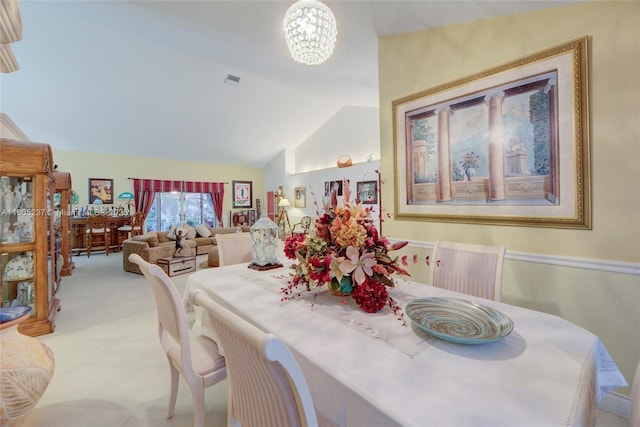 596 NW 164th Ave, Pembroke Pines, FL 33028 - dining area with vaulted ceiling and a chandelier