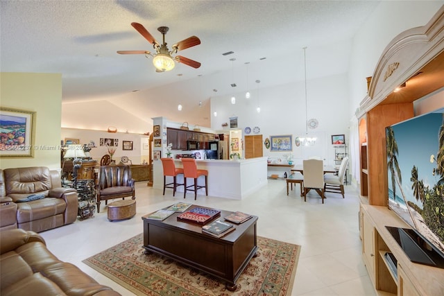 596 NW 164th Ave, Pembroke Pines, FL 33028 - living area featuring ceiling fan, high vaulted ceiling, a chandelier, light tile patterned floors, and a textured ceiling