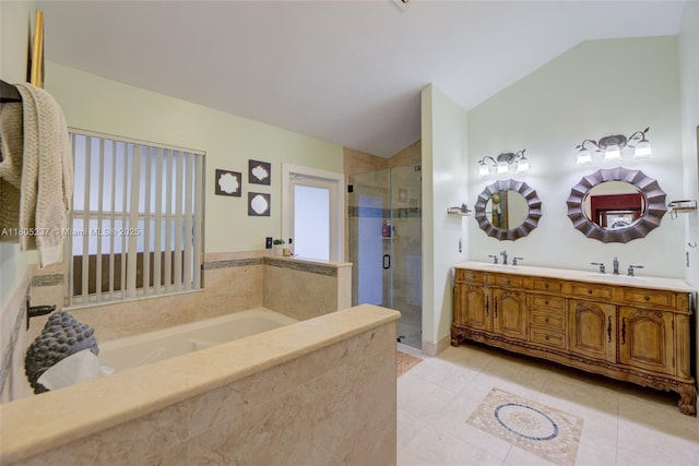 596 NW 164th Ave, Pembroke Pines, FL 33028 - full bath featuring vaulted ceiling, a bath, a stall shower, double vanity, and tile patterned floors