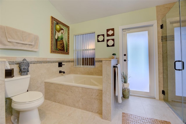 596 NW 164th Ave, Pembroke Pines, FL 33028 - full bathroom with a bath, tile patterned floors, a shower stall, and lofted ceiling