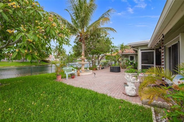 596 NW 164th Ave, Pembroke Pines, FL 33028 - view of patio / terrace featuring a water view and outdoor dining space
