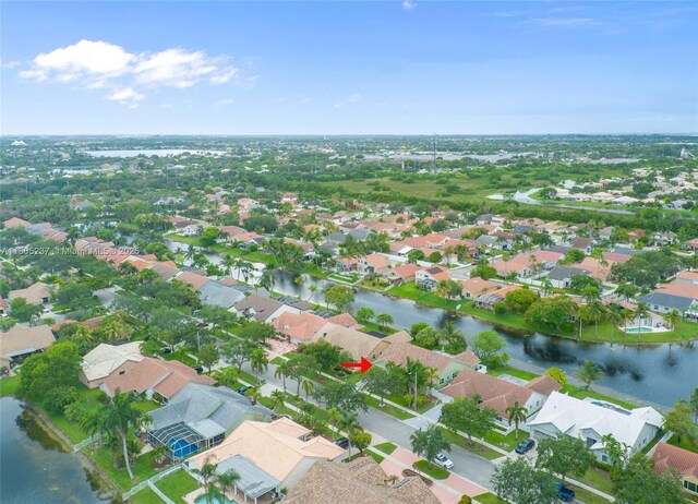 596 NW 164th Ave, Pembroke Pines, FL 33028 - aerial overview of property's location featuring a large body of water and nearby suburban area