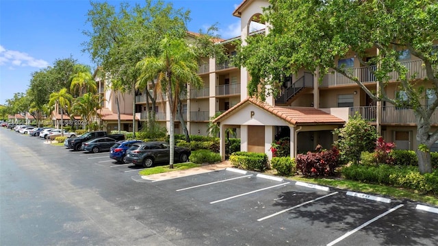 1300 SW 124th Ter Unit 107P, Pembroke Pines, FL 33027 - view of apartment building / complex with uncovered parking