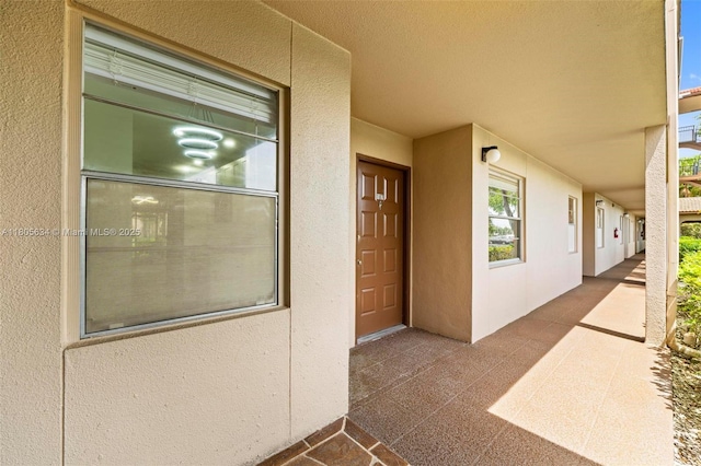 1300 SW 124th Ter Unit 107P, Pembroke Pines, FL 33027 - doorway to property featuring stucco siding