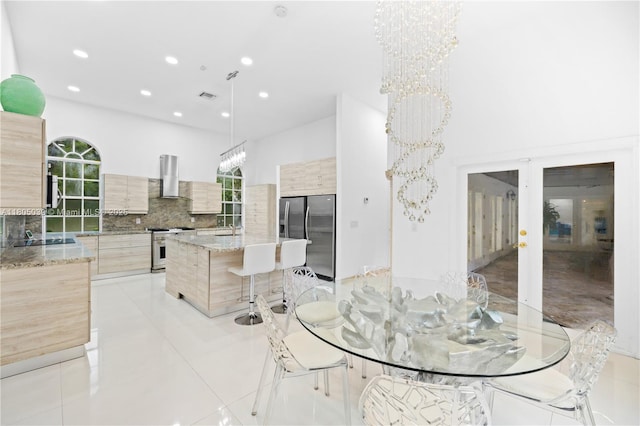 12300 Old Cutler Rd, Pinecrest, FL 33156 - dining space featuring recessed lighting, a chandelier, light tile patterned floors, and a towering ceiling