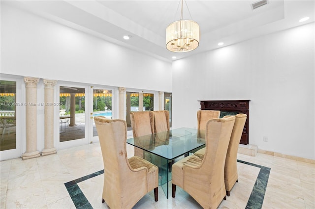 12300 Old Cutler Rd, Pinecrest, FL 33156 - dining area featuring recessed lighting, french doors, a chandelier, a towering ceiling, and marble tiled flooring