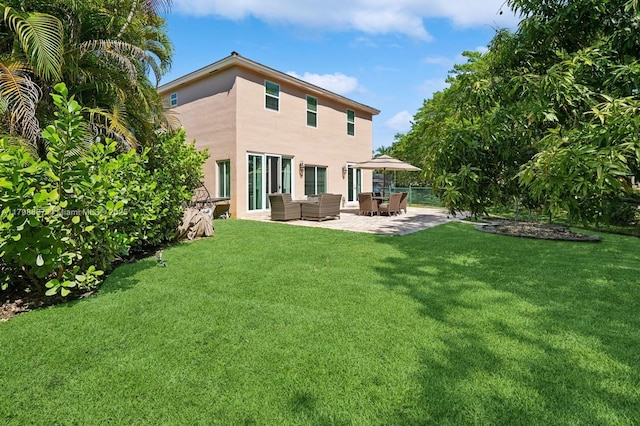 20701 NW 3rd Ct, Pembroke Pines, FL 33029 - back of house with an outdoor living space, a patio, a yard, and stucco siding