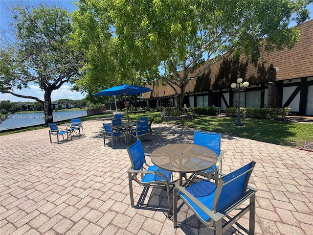 3660 Inverrary Dr Unit 2W, Lauderhill, FL 33319 - view of patio with outdoor dining space