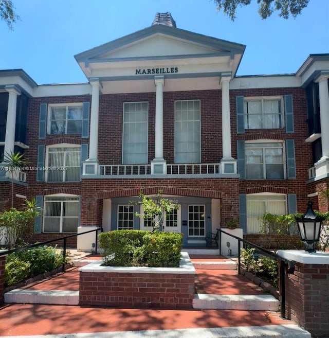 3660 Inverrary Dr Unit 2W, Lauderhill, FL 33319 - view of front facade with brick siding
