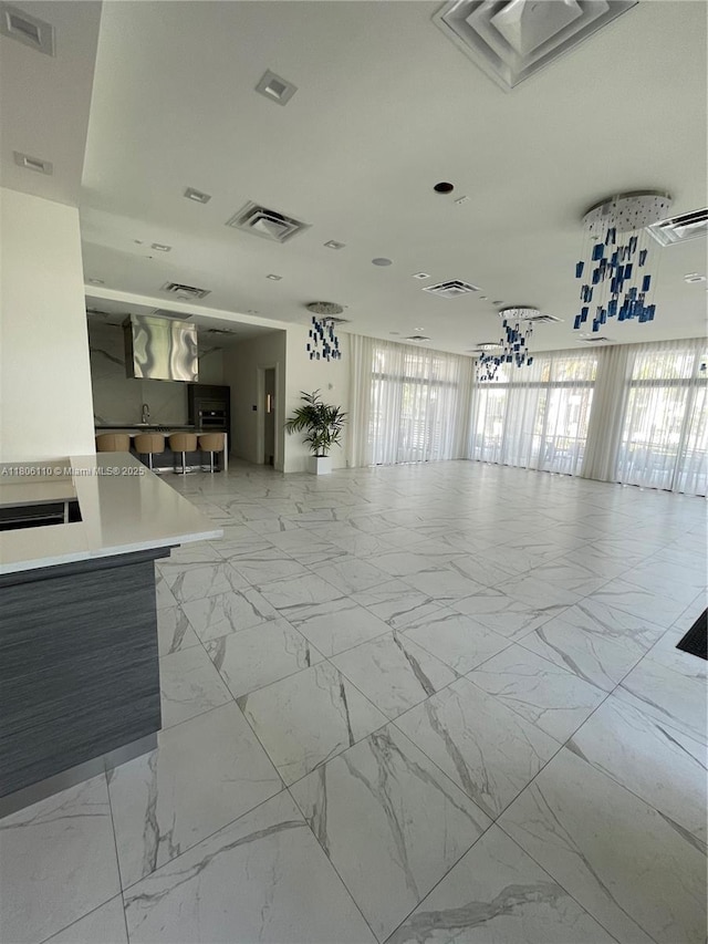 8001NW 41st St Unit F-108, Doral, FL 33166 - interior space featuring light marble finish floors