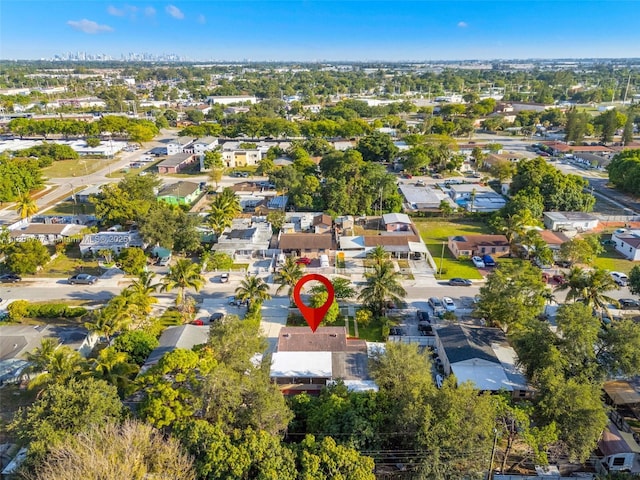 aerial view of property's location featuring nearby suburban area