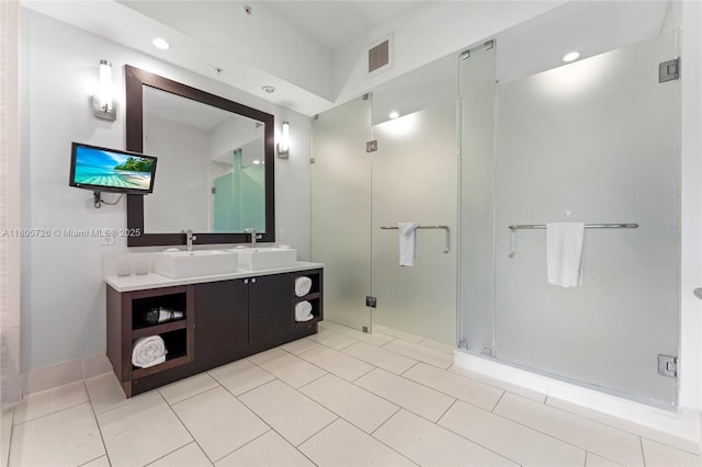 full bath with a stall shower, tile patterned flooring, vanity, recessed lighting, and baseboards