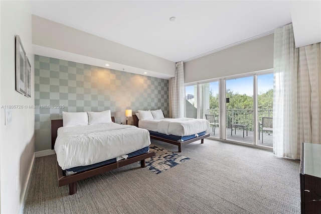 carpeted bedroom with access to outside, wallpapered walls, and baseboards