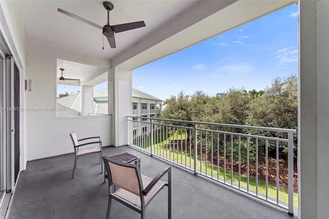 balcony featuring a ceiling fan