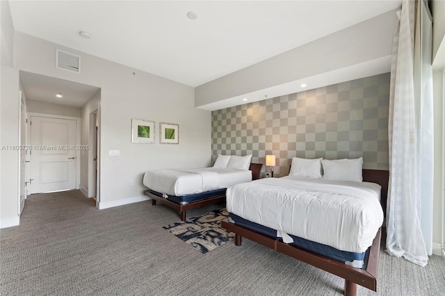 bedroom featuring carpet floors, baseboards, and recessed lighting