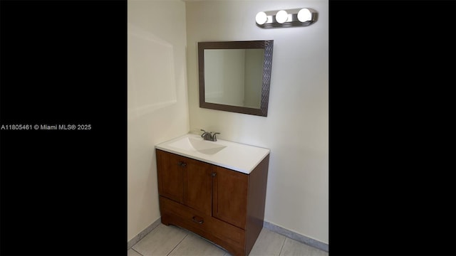 2450 NE 135th St Unit 805, North Miami, FL 33181 - bathroom with tile patterned flooring, vanity, and baseboards