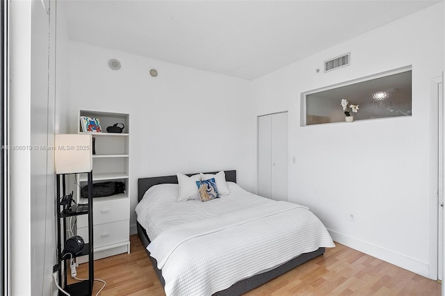 350 NE 24th St Unit 714, Miami, FL 33137 - bedroom with wood finished floors and baseboards