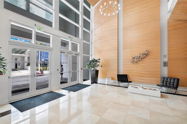 350 NE 24th St Unit 714, Miami, FL 33137 - lobby featuring a towering ceiling and wood walls