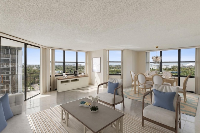 1901 Brickell Ave Unit B1408, Miami, FL 33129 - living area featuring a wall of windows, a textured ceiling, a chandelier, and light tile patterned floors