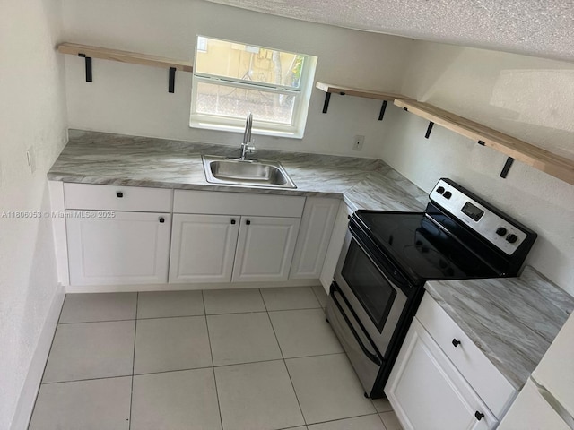 126 NW 13th Ave, Dania Beach, FL 33004 - kitchen featuring stainless steel electric range oven, a sink, white cabinets, open shelves, and light countertops