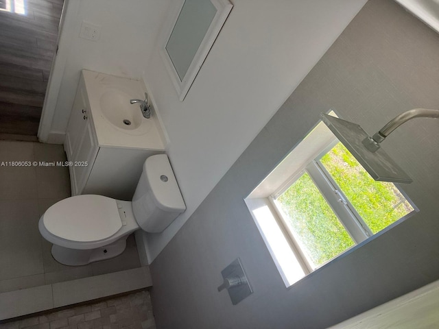 126 NW 13th Ave, Dania Beach, FL 33004 - bathroom featuring tile patterned floors, vanity, and toilet