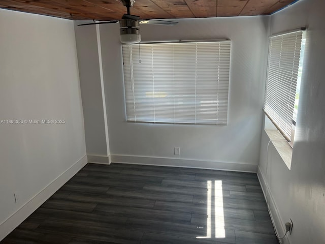 126 NW 13th Ave, Dania Beach, FL 33004 - spare room with ceiling fan, dark wood-style floors, baseboards, and wood ceiling