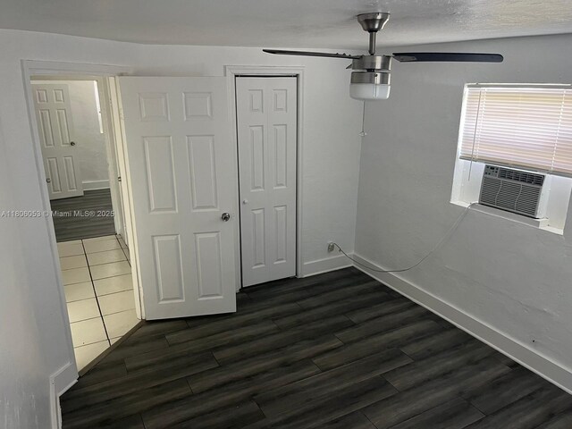 126 NW 13th Ave, Dania Beach, FL 33004 - empty room featuring ceiling fan, dark wood finished floors, baseboards, and cooling unit
