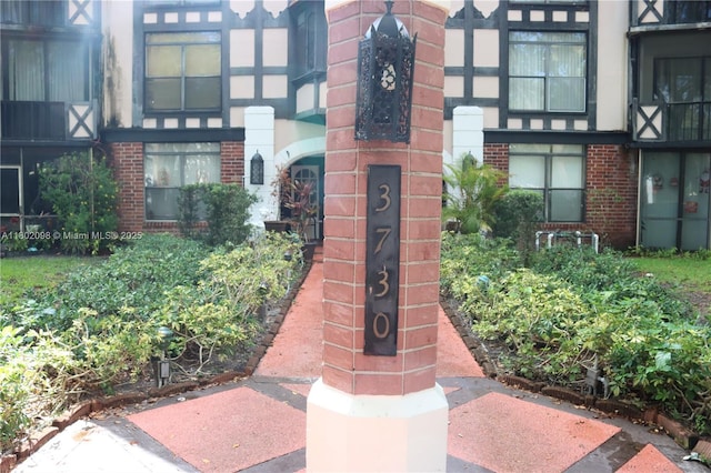 3730 Inverrary Dr Unit 2Y, Lauderhill, FL 33319 - view of exterior entry featuring brick siding