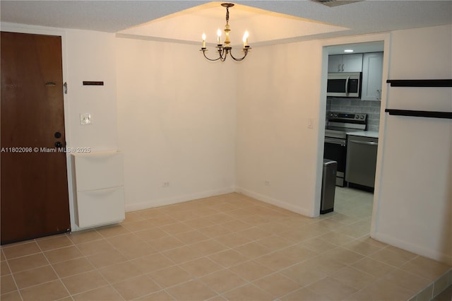 3730 Inverrary Dr Unit 2Y, Lauderhill, FL 33319 - unfurnished dining area featuring a chandelier, baseboards, and light tile patterned floors