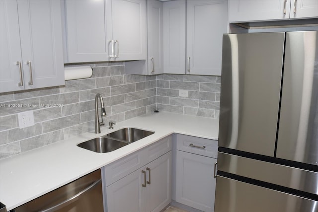 3730 Inverrary Dr Unit 2Y, Lauderhill, FL 33319 - kitchen featuring stainless steel appliances, a sink, light countertops, and backsplash