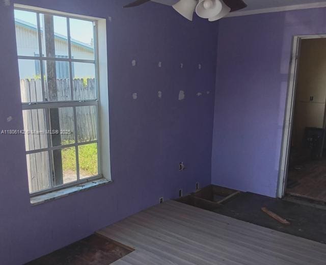 884 Montego Dr, West Palm Beach, FL 33415 - spare room featuring ceiling fan and wood finished floors