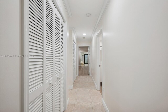 7935 SW 155th St, Palmetto Bay, FL 33157 - hallway featuring light tile patterned floors, ornamental molding, baseboards, and recessed lighting