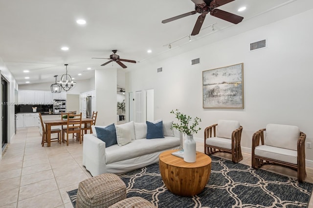 7935 SW 155th St, Palmetto Bay, FL 33157 - living room featuring ceiling fan, recessed lighting, light tile patterned floors, and a chandelier