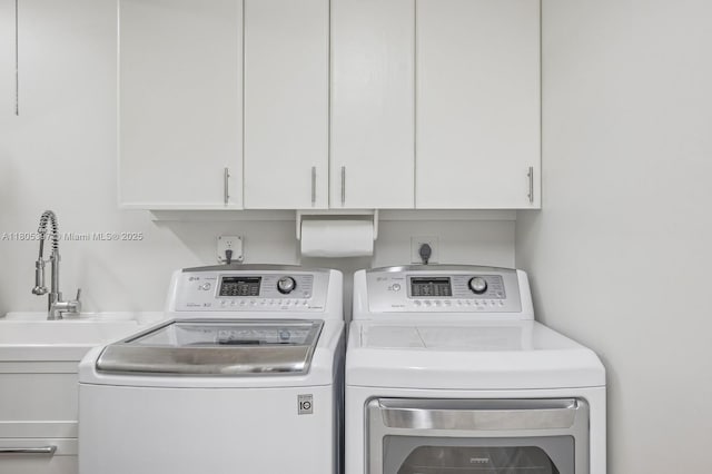 7935 SW 155th St, Palmetto Bay, FL 33157 - laundry room featuring washing machine and clothes dryer and cabinet space