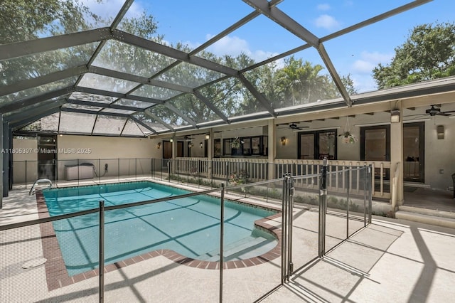 7935 SW 155th St, Palmetto Bay, FL 33157 - view of swimming pool with ceiling fan, a patio, french doors, and glass enclosure